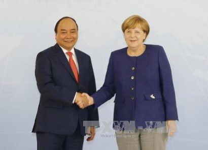  Thủ tướng Nguyễn Xuân Phúc và Thủ tướng Angela Merkel. Ảnh TTXVN