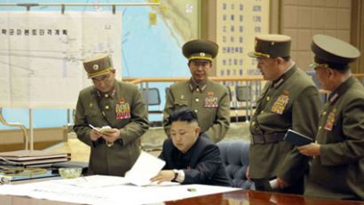 "Songun" và "Juche" là 2 từ phổ biến được ông Kim Jong-un dùng để "biện minh" cho chương trình hạt nhân và tên lửa của Triều Tiên. Ảnh: EPA