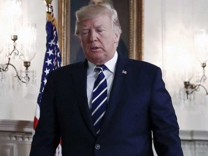 Tổng thống Trump vẫn không thể đưa ra được giải pháp cho “đại dịch” tấn công bằng súng tại Mỹ. Ảnh: AP