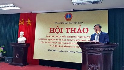 Chánh án TANDTC Nguyễn Hòa Bình phát biểu tại hội thảo