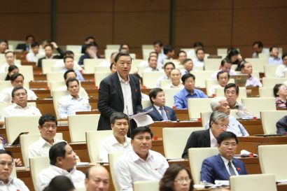 Bộ trưởng Bộ Công an Tô Lâm trả lời trước Quốc hội. (Ảnh: Đàm Duy)