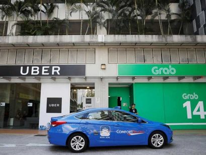  Thương vụ sáp nhập Uber tại Đông Nam Á vào Grab đã được công bố vào ngày 26-3. Ảnh: REUTERS