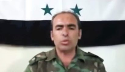  Trung tá Hussein Harmoush, một trong những người lập ra lực lượng "Quân đội Syria tự do" - Ảnh: REUTERS