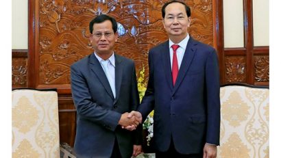 Chủ tịch nước Trần Đại Quang và Thứ trưởng Bộ An ninh Lào Kongthong Phongvichit