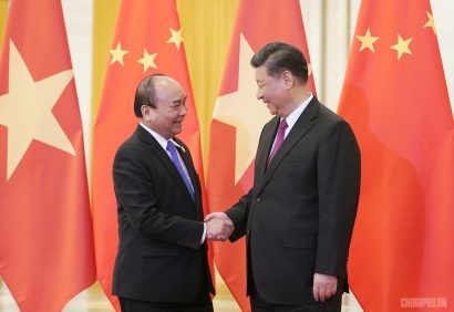 Thủ tướng Nguyễn Xuân Phúc và Tổng Bí thư, Chủ tịch Trung Quốc Tập Cận Bình. Ảnh Quang Hiếu
