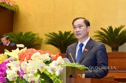  Chủ nhiệm Ủy ban Kinh tế Vũ Hồng Thanh trình bày báo cáo (Ảnh: Quochoi.vn).