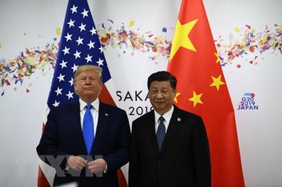  Tổng thống Mỹ Donald Trump (trái) và Chủ tịch Trung Quốc Tập Cận Bình trong cuộc hội đàm bên lề Hội nghị thượng đỉnh G20 tại Osaka, Nhật Bản, ngày 29/6/2019. (Ảnh: AFP/TTXVN)