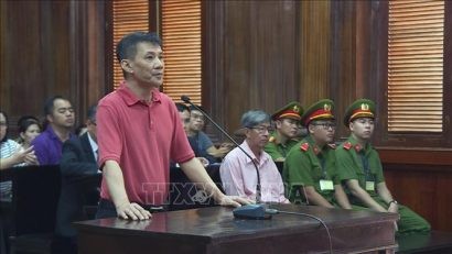 Bị cáo Nguyen Michael Phuong Minh tại phiên tòa. Ảnh: TTXVN phát