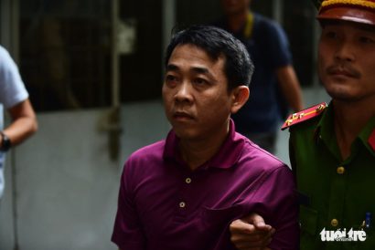  Bị cáo Nguyễn Minh Hùng đến tòa sáng 24-9 - Ảnh: QUANG ĐỊNH