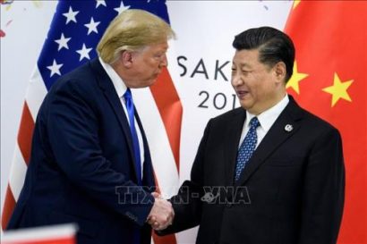 Tổng thống Mỹ Donald Trump và Chủ tịch Trung Quốc Tập Cận Bình tại một sự kiện. Ảnh: AFP/TTXVN 